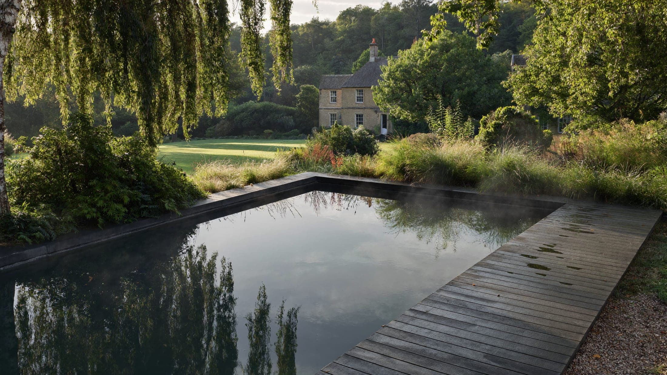 Bespoke garden pool with timber surround